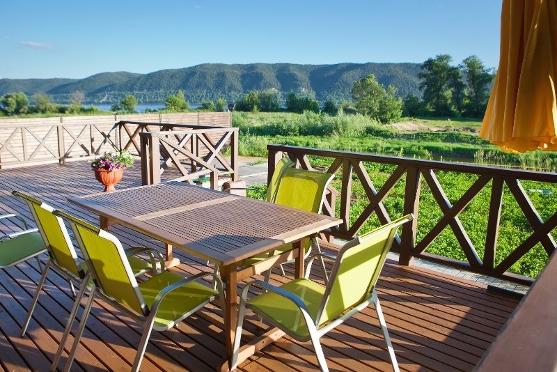 outdoor living area with deck facing the mountain